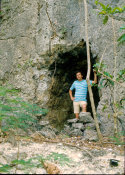 Wilcommen, No. 0119 White Man Poses at the Mouth of a Cave